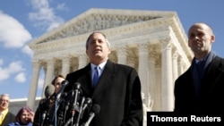 FILE - Texas Attorney General Ken Paxton addresses reporters on the steps of the U.S. Supreme Court in Washington, March 2, 2016.