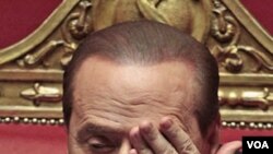 Perdana Menteri Silvio Berlusconi, setelah berpidato di depan Senat Italia (21/6).