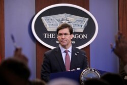 FILE - U.S. Defense Secretary Mark Esper speaks during a press briefing at Pentagon in Arlington, Virginia, Dec. 20, 2019.