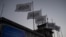 FILE - Taliban flags flutter at the airport in Kabul, Afghanistan, Sept. 9, 2021.