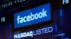 The Latest: Facebook Market Value Plunges $119 Billion