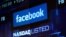 FILE - Monitors displays the Facebook, Inc. stock during morning trading at the NASDAQ Marketsite in New York, NY, U.S., June 4, 2012.