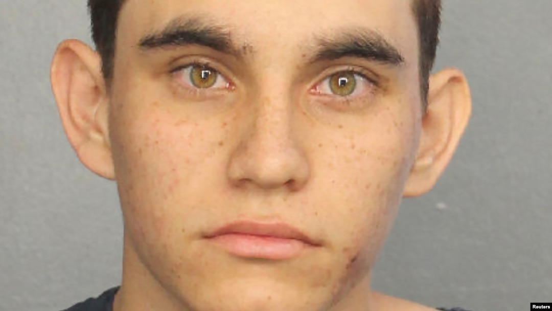 Nikolas Cruz appears in a police booking photo after being charged with 17 counts of premeditated murder following a Parkland school shooting, at Broward County Jail in Fort Lauderdale, Florida, Feb. 15, 2018.