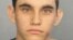 Nikolas Cruz appears in a police booking photo after being charged with 17 counts of premeditated murder following a Parkland school shooting, at Broward County Jail in Fort Lauderdale, Florida, Feb. 15, 2018.