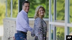 Republican presidential candidate, former Massachusetts Governor Mitt Romney and his wife, Ann, arrive at Brewster Academy, for convention preparations in Wolfeboro, New Hampshire, Aug. 27, 2012.