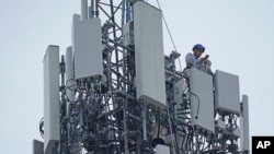 FILE: Representative illustration of a mobile phone tower, taken May 4, 2021.