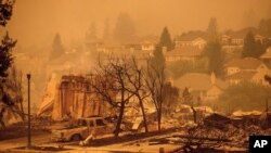 Homes leveled by the Glass Fire line a street in the Skyhawk neighborhood of Santa Rosa, Calif., on Sept. 28, 2020.