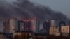 Smoke rises in the sky over the city after a Russian drone strike, amid Russia's attack on Ukraine, in Kyiv, Ukraine, November 7, 2024. 