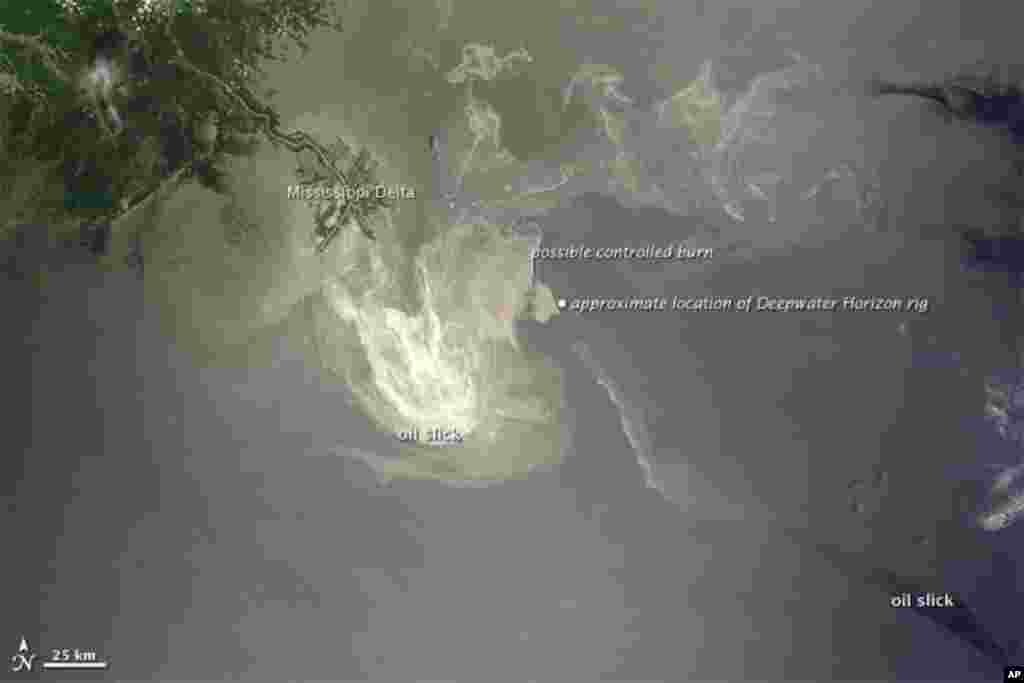 Sunlight illuminates the lingering oil slick off the Mississippi Delta, 24 May 2010.  (NASA Image)
