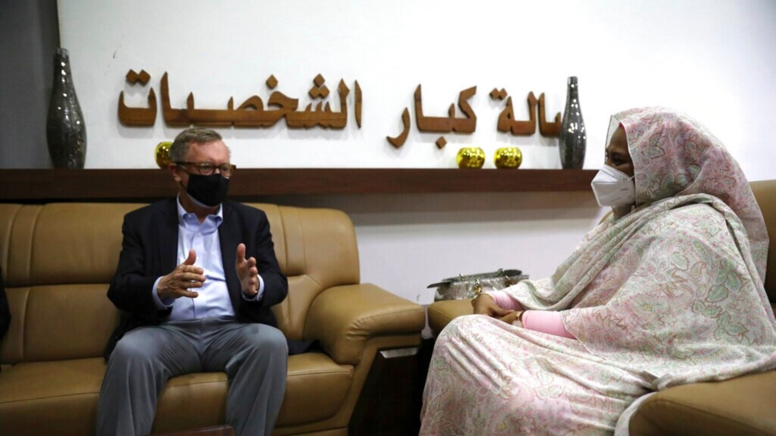 U.S. Special Envoy for the Horn of Africa Jeffrey Feltman, left, meets with Sudanese Foreign Minister Maryam al-Sadiq al-Mahdi in Khartoum, Sudan, May 7, 2021.