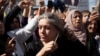 Women protest over the death of Mahsa Amini in Iran, in the Kurdish-controlled city of Qamishli