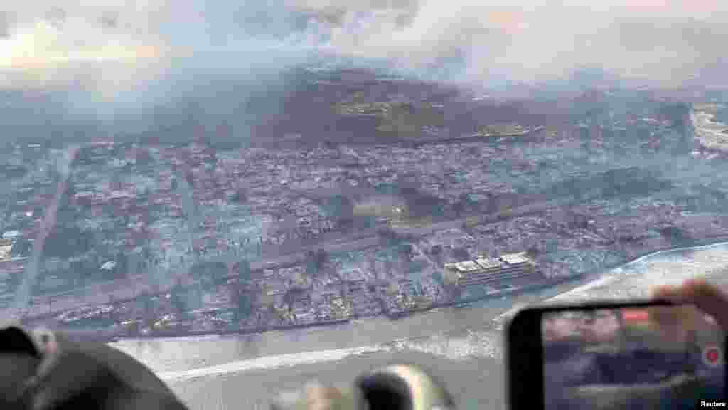 An aerial view shows damage along the coast of Lahaina in the aftermath of wildfires in Maui, Hawaii, U.S. August 9, 2023 this screen grab obtained from social media video. (Richard Olsten/Air Maui Helicopters/via Reuters)