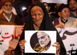 Pakistani Shiite Muslims demonstrate Jan. 3, 2020 in Karachi, Pakistan, over the U.S. airstrike in Iraq that killed Iranian Revolutionary Guard Gen. Qassem Soleimani.