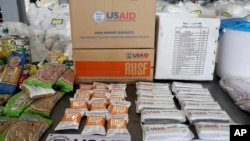 ARHIVA: Humanitarna pomoć koju distribuira USAID u skladišu u Kolumbiji (Foto: AP/Fernando Vergara)