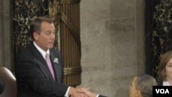 El presidente del Congreso, el republicano John Boehner, y el presidente Obama, se estrechan las manos antes de que el mandatario iniciara su discurso.