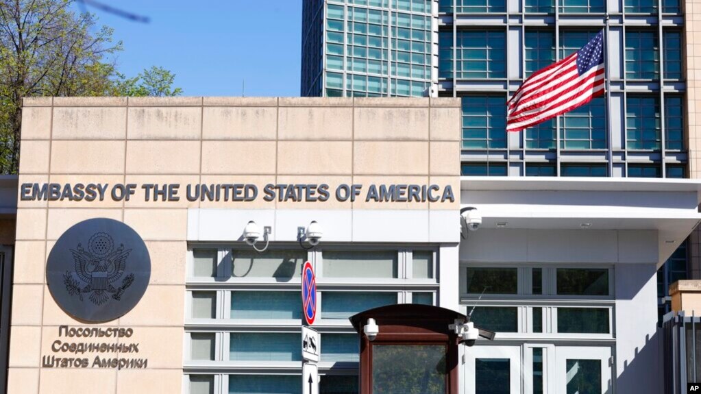 FILE - The U.S. Embassy and the national flag are seen in Moscow, Russia, May 11, 2021.