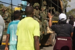 Malawi military has now stepped in to help provide security during the protests to quell violence and vandalism. (L. Masina for VOA)