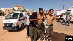 Fòs ki Fidèl ak Kadhafi yo Touye 15 Gad Konsèy Nasyonal Tranzisyon an