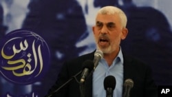 FILE - Yahya Sinwar, head of Hamas in Gaza, delivers a speech at a hall on the seaside of Gaza City, on April 30, 2022. On Oct. 17, 2024, Israel said it killed Sinwar in an operation on the Gaza Strip. 