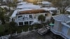 A drone view shows buildings and other structures damaged by Hurricane Milton after it made landfall, in Venice, Florida, Oct. 10, 2024.