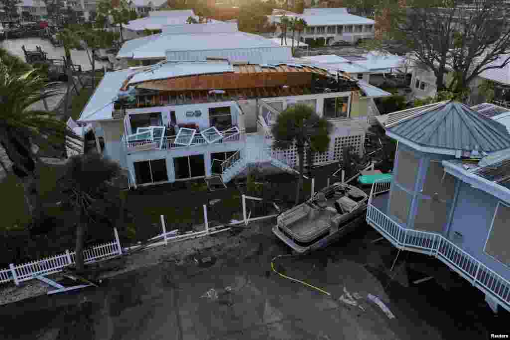 A drone view shows buildings and other structures damaged by Hurricane Milton after it made landfall, in Venice, Florida, Oct. 10, 2024.