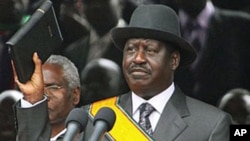 Kenyan Prime Minister Raila Odinga takes a new oath of office after signing the new constitution into law, at Uhuru Park in Nairobi, Aug 27, 2010 (file photo)