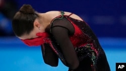 FILE - Kamila Valieva, of the Russian Olympic Committee, reacts after the women's free skate program during the figure skating competition at the 2022 Winter Olympics, Thursday, Feb. 17, 2022 in Beijing. (AP Photo/Bernat Armangue)