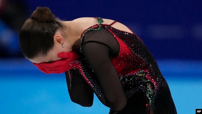 FILE - Kamila Valieva, of the Russian Olympic Committee, reacts after the women's free skate program during the figure skating competition at the 2022 Winter Olympics, Thursday, Feb. 17, 2022 in Beijing. (AP Photo/Bernat Armangue)