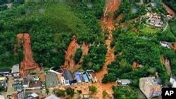 An aerial view of a mudslide in Teresopolis, Brazil, after rain tore through Rio de Janeiro's mountains, Jan 12, 2011