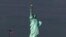Mutum-mutumin da ake kira Statue of Liberty a Amurka, wanda wuri ne da Amurka take tunkaho da shi. 