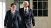 FILE - President Joe Biden and Japanese Prime Minister Fumio Kishida walk at the White House, Jan. 13, 2023. Biden will host Kishida on April 10, with the goal of strengthening a critical alliance as the U.S. has sought to counter China's influence in the Indo Pacific region. 