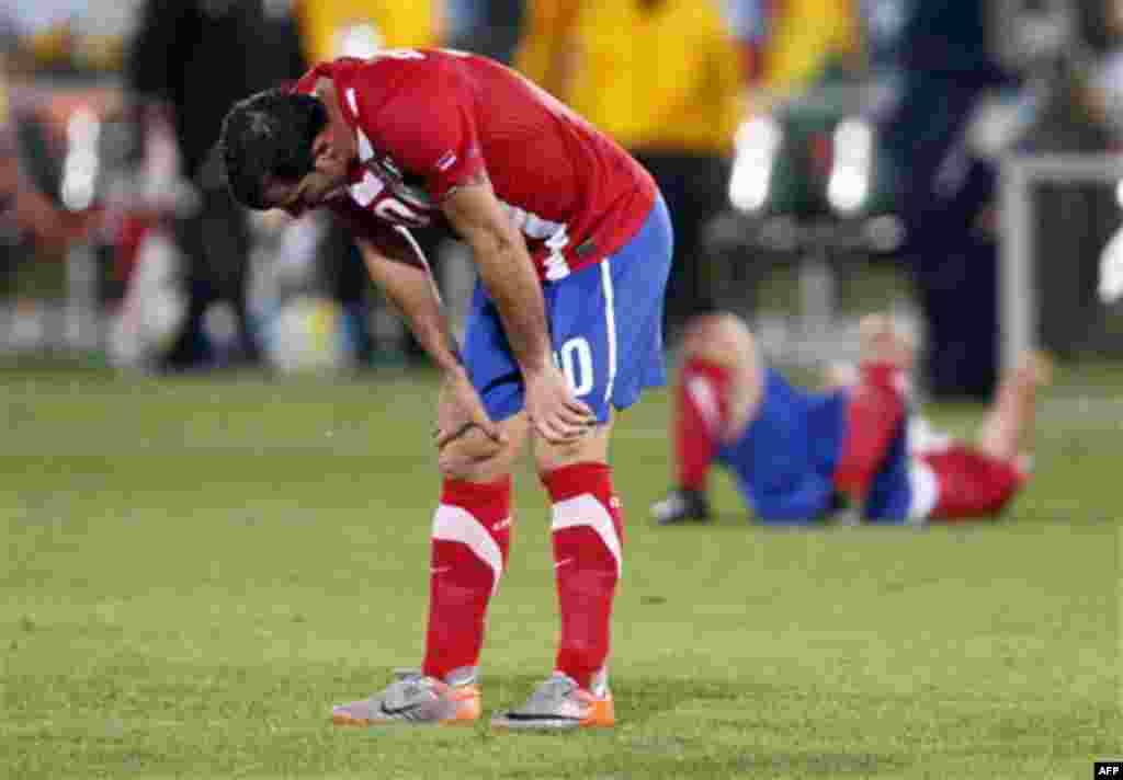 Serbia's Dejan Stankovic reacts at the end of the World Cup group D soccer match between Serbia and Ghana at the Loftus Versfeld Stadium in Pretoria, South Africa, Sunday, June 13, 2010. Ghana won 1-0. (AP Photo/Darko Vojinovic)