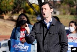 FILE - Democratic nominee for U.S. Senate from Georgia Jon Ossoff speaks after voting early in Atlanta, Dec. 22, 2020.