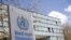 FILE - A logo is pictured outside a building of the World Health Organization (WHO) in Geneva, Switzerland, April 6, 2021. 