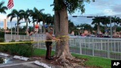 Des policiers dans la station balnéaire de Trump National Doral, en Floride, le 18 mai 2018.