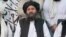 Mullah Baradar Akhund, a senior official of the Taliban, seated with a group of men, makes a video statement, in this still image taken from a video recorded in an unidentified location and released on August 16, 2021. Social Media/via REUTERS THIS IMAGE HAS BEEN SUPPLIED BY A 