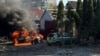 A car burns at the site of a Russian missile strike in Zaporizhzhia, Ukraine, on April 5, 2024. (Press service of the National Police of Ukraine via Reuters)
