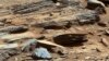 FILE - An image from NASA's Mars rover Curiosity shows the surface of the planet in this NASA handout released January 15, 2013.