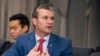 Secretary of Defense Pete Hegseth responds to a reporter's question at the Pentagon, Feb. 7, 2025, near Washington.