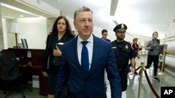 FILE - Kurt Volker, a former special envoy to Ukraine, leaves after a closed-door interview with House investigators as House Democrats proceed with the impeachment investigation of President Donald Trump, at the Capitol in Washington, Oct. 3, 2019.