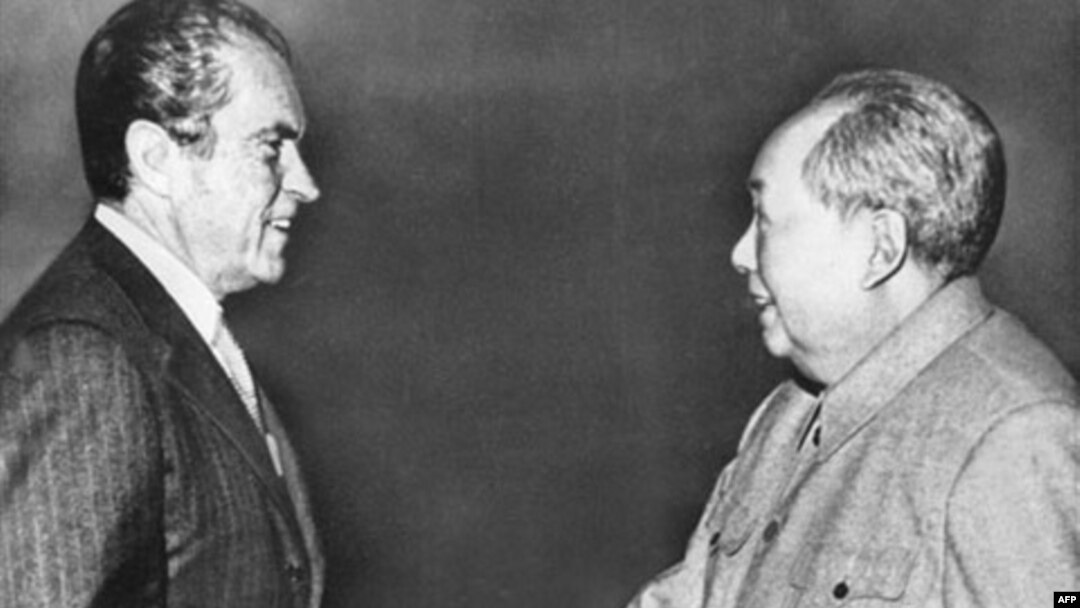 In this Feb 21, 1972 photo, President Richard M. Nixon, left, shakes hands with Chinese leader Mao Zedong during Nixon's groundbreaking trip to China