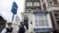 Police officers stand outside the City Stay Hotel used by two suspected Russian military intelligence agents — who have been accused of attempting to murder former Russian spy Sergei Skripal and his daughter Yulia — in London, Britain, Sept. 5, 2018. 