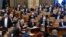 Hungarian Prime Minister Viktor Orban votes the law granting the government special powers to combat the coronavirus disease (COVID-19) crisis at the Hungarian parliament in Budapest, Hungary, March 30, 2020.