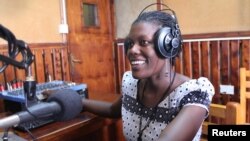 Mama FM puts women’s voices and perspectives on the air, in a country where 85 percent of radio voices belong to men, Kampala, Uganda, June 18, 2014. (Hilary Heuler/VOA)