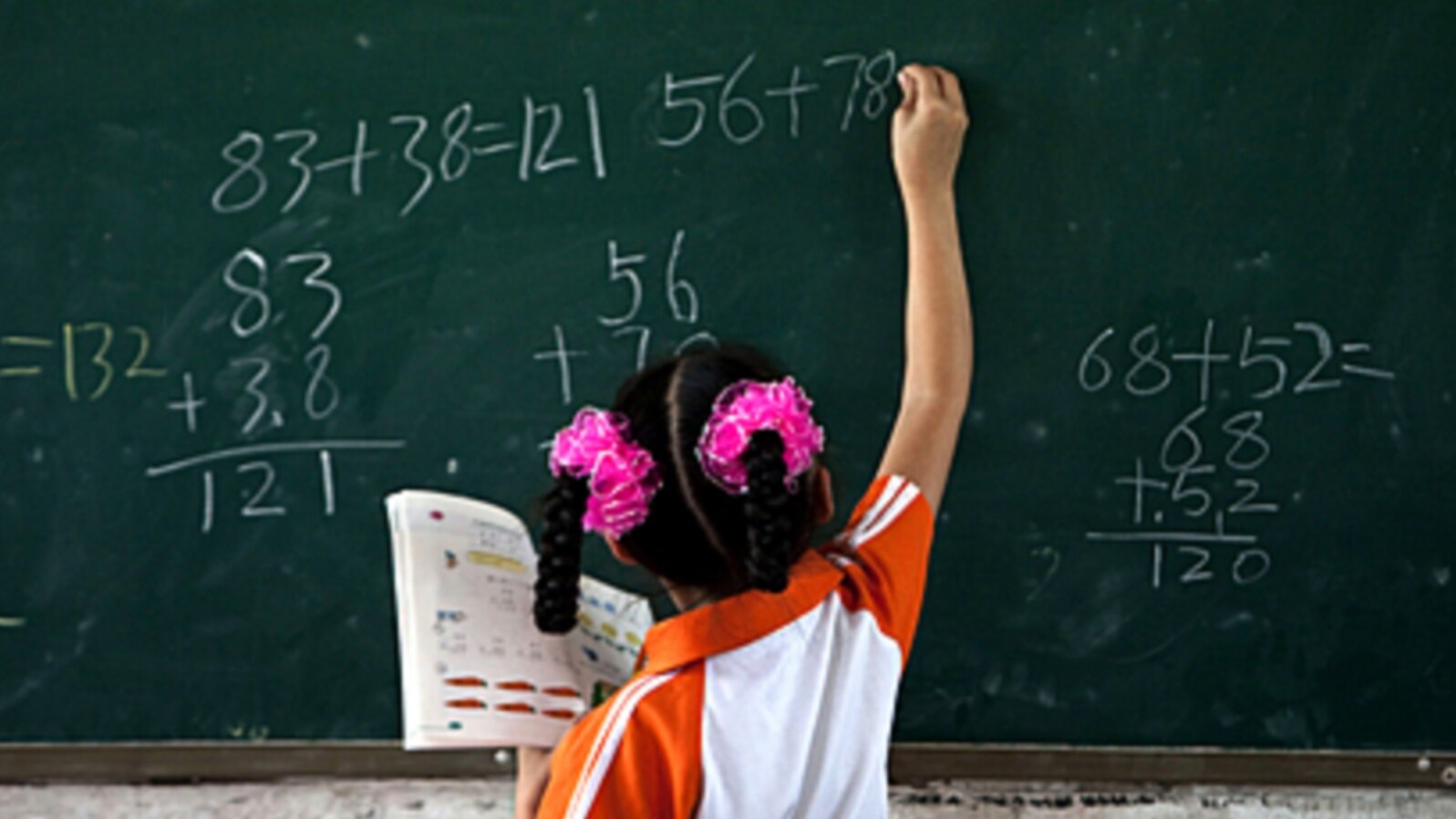 FILE - Researchers have found that poor children who tested lower on standardized tests had delays in brain development and volume. 