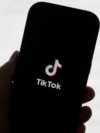 FILE - A TikTok logo is shown on a phone in San Francisco, Jan. 17, 2025.