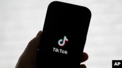 FILE - A TikTok logo is shown on a phone in San Francisco, Jan. 17, 2025.