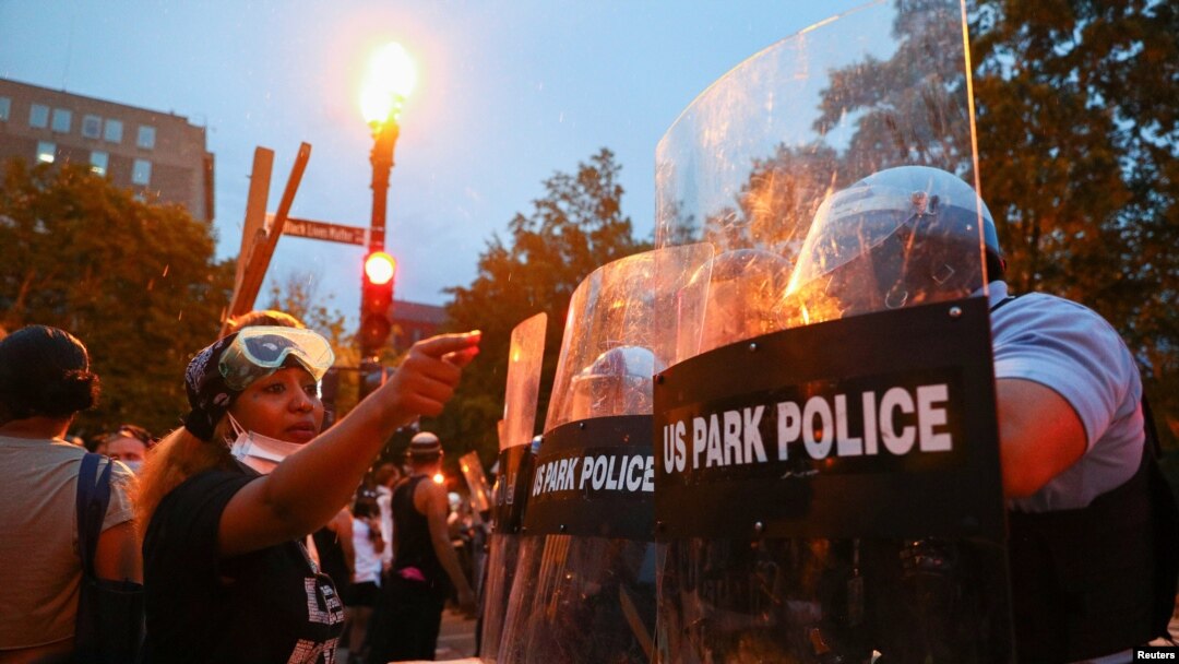 Protestors and police face off at Lafayette Park in front of the White House after police clashed with demonstrators trying to pull down the statue of U.S. President Andrew Jackson in the park during racial inequality protests in Washington.