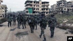 Pasukan Suriah melakukan patroli di Salma, provinsi Latakia (foto: dok).