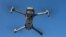 FILE - A drone is seen in the sky as Chinese drone maker DJI holds a demonstration to display an app that tracks a drone's registration and owner in Montreal, Canada, Nov. 13, 2019.